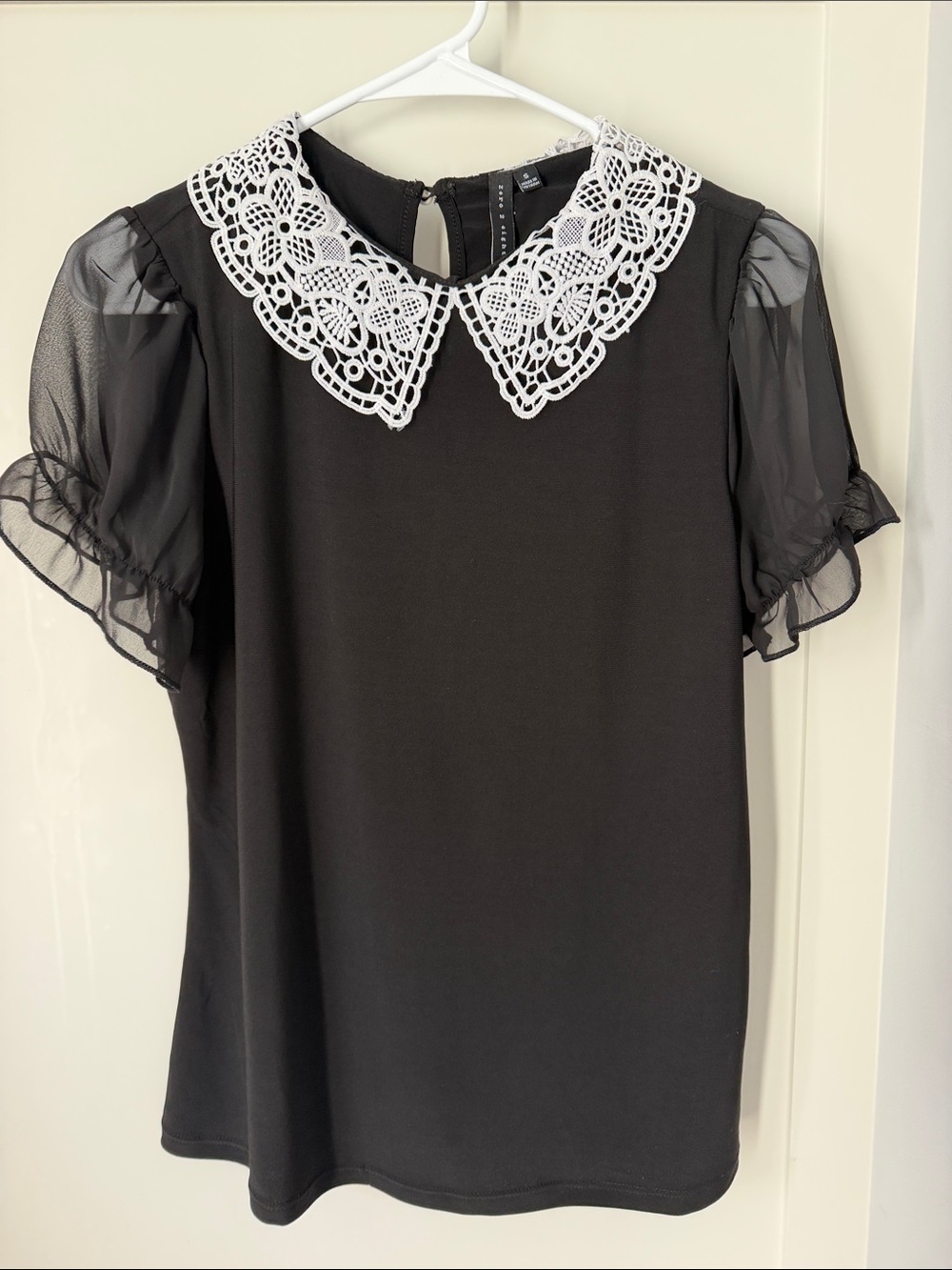 Black Short-Sleeve Blouse with White Crochet Peter Pan Collar